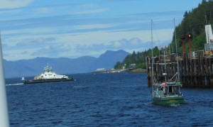 The boat with the white top.